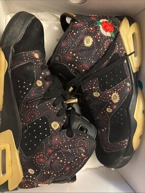 Jordan Black High-Top Sneakers with Gold and Red Embroidery